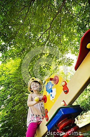 Little girl on seesaw/teeter-totter Stock Photo