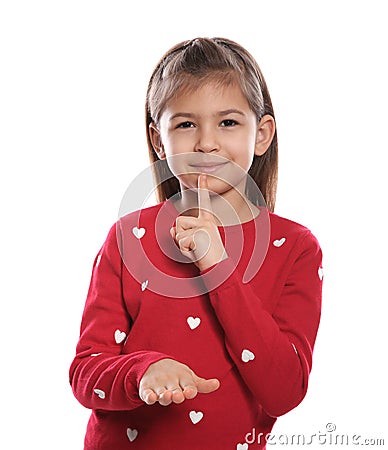 Little girl showing HUSH gesture in sign language on white Stock Photo