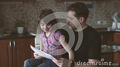 Little Girl Shows Her Drawings To Her Dad. Father and Daughter Together Stock Video - Video of parenting, home: 90503671 