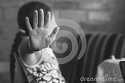 Little girl shows stop. Children violence and abused concept. Stock Photo