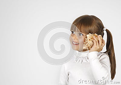 Little girl simulate phone calling Stock Photo