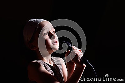 Little girl singing Stock Photo