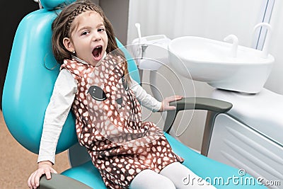 Child in the dental chair Stock Photo