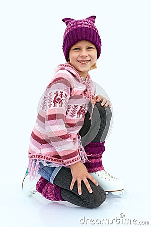 The little girl sitting on ice in ice skating. Isol Stock Photo