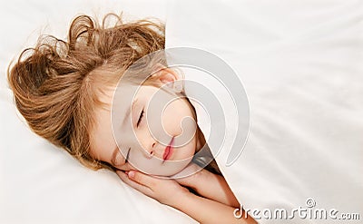 Little girl sleep in the bed Stock Photo