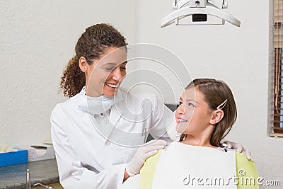 Little girl smiling with her pediatric dentist Stock Photo