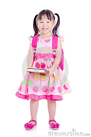 Little girl standing over white background Stock Photo