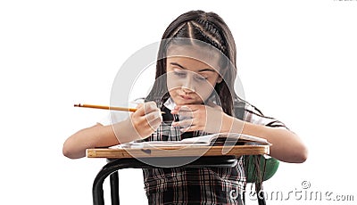 Little girl studying on white background Stock Photo