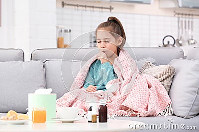 Little girl suffering from cough and cold Stock Photo