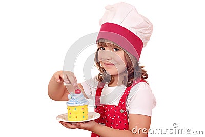 Little girl with sweet cupcake Stock Photo