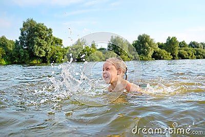 Little girl swim on river Stock Photo