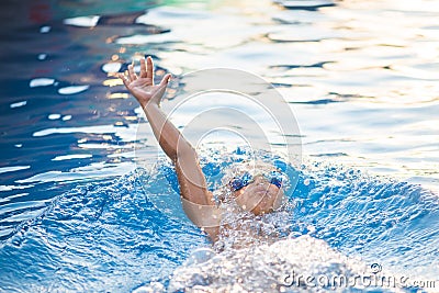 Portrait of a little swimer at the pool Stock Photo