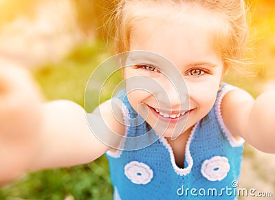 Little girl taken pictures of her self Stock Photo