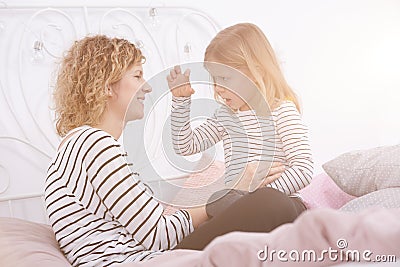 Little girl telling a story Stock Photo