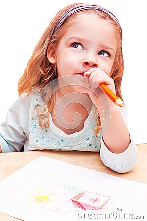 Little girl thought about drawing Stock Photo