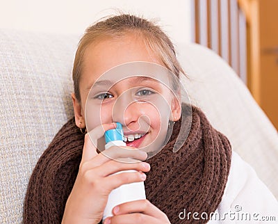 Little girl treating for rhinitis Stock Photo