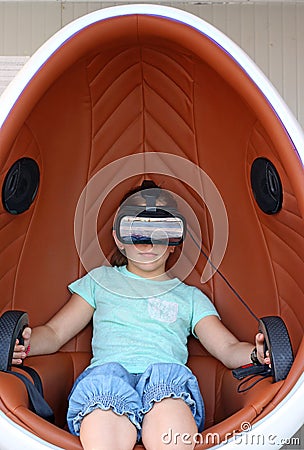Little girl with virtual reality headset Stock Photo