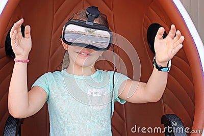 Little girl with vr headset Stock Photo