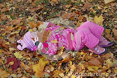 Little girl walks in autumn Stock Photo