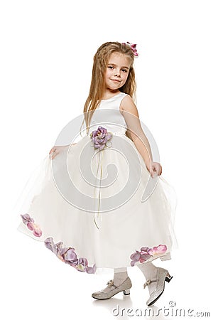 Little girl in white ball dress Stock Photo