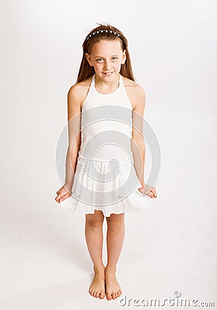 Little girl in white dress Stock Photo