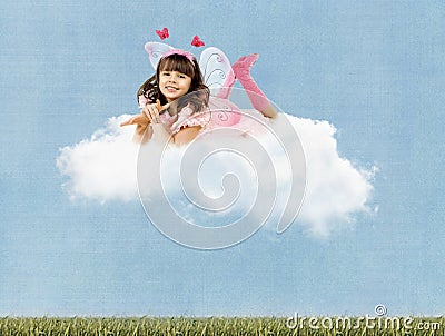 Little girl with wings clouds Stock Photo