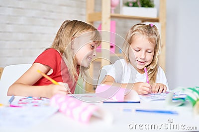 Little Girls Drawing Together Stock Photo