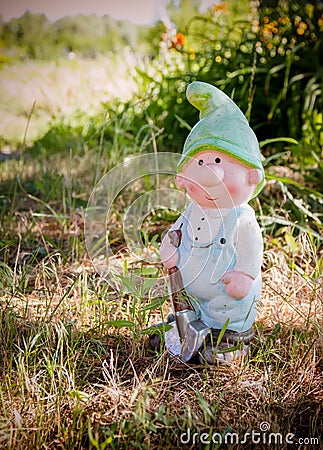 A little gnome under a tree, boy Stock Photo
