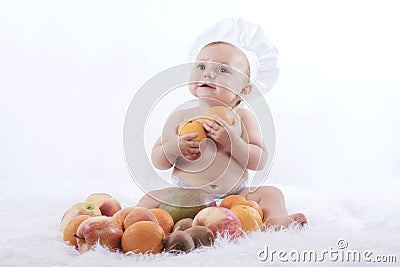 Baby with fruits Stock Photo