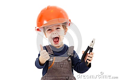 Little happy repairman in hardhat with pliers show thumb up Stock Photo