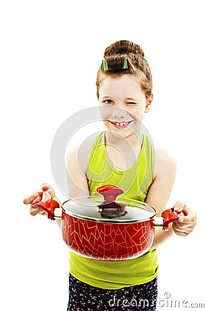 Little homemaker holding pan with ready meal, soup. Winks Stock Photo
