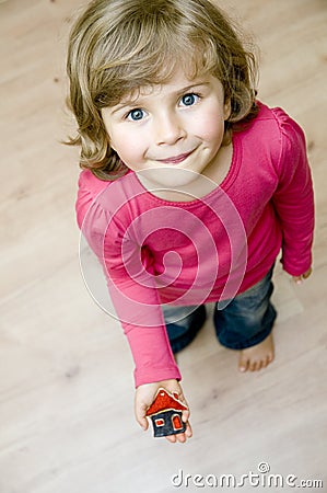 Little house on cute girl hand Stock Photo