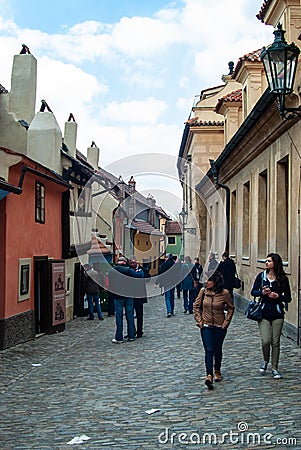 Little houses and tourists on Golden street Editorial Stock Photo