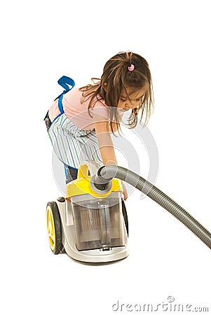 Little housewife with vacuum cleaner Stock Photo