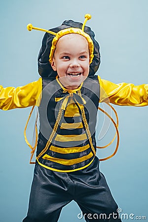 Little kid with a bee costume on carnival. Happy little boy. Close-up. Adorable baby having fun. Funny boy. Happy Stock Photo