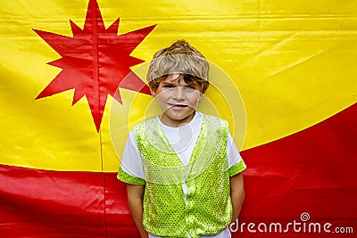 Little kid boy in colorful magician costume. Happy child making circus as school project Stock Photo