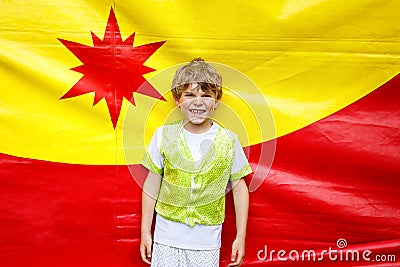 Little kid boy in colorful magician costume. Happy child making circus as school project Stock Photo