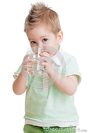 Little kid or child drinking water from glass Stock Photo