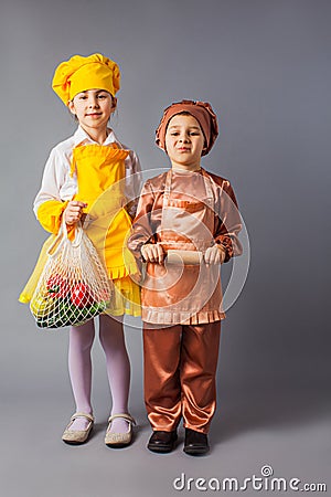 The little kids dream of a cook profession Stock Photo