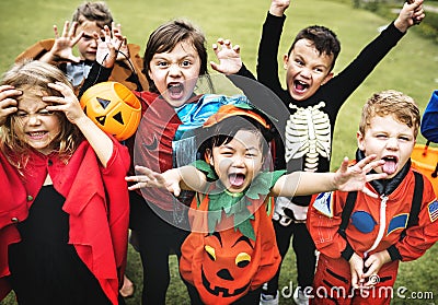 Little kids at a Halloween party Stock Photo