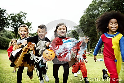 Little kids at a Halloween party Stock Photo