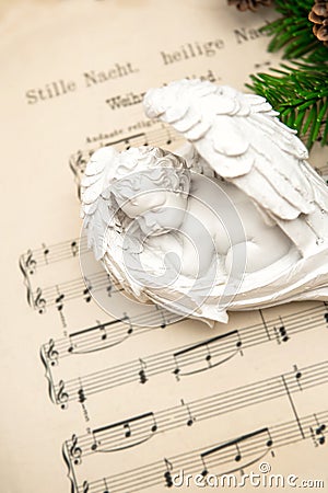 Little lovely sleeping angel with christmas decoration Stock Photo