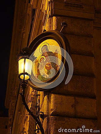 Little Madonna or Madonnele Mosaic Light on Street Corner in Rom Stock Photo