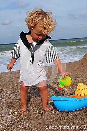 Little mariner and ship Stock Photo