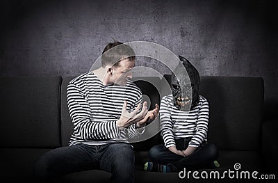 Little monster kid and his father concept Stock Photo