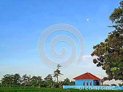 Little moon in the blue sky Stock Photo