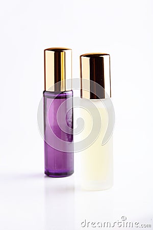 Little parfume bottle on white background Stock Photo