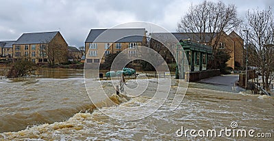 Flooding river Ouse causing bridge and road to be shut off. Editorial Stock Photo