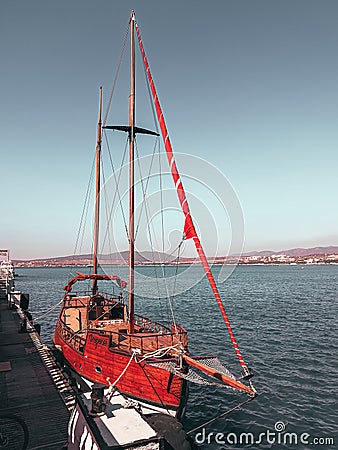 little Pleasure ship at the pier Stock Photo