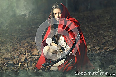 Little red riding hood waiting the prey Stock Photo